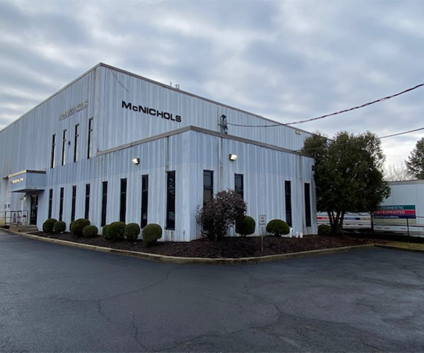 A photo of the front entrance of the McNICHOLS Metals Service Center Location in New Brunswick.