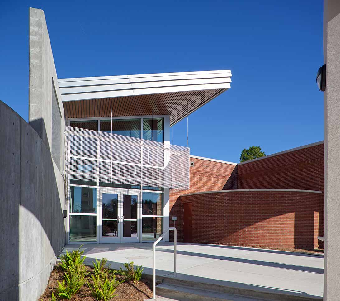 A building with Aluminum Bar Grating used as a sunshade at Georgia Southern University's Armstrong Campus.