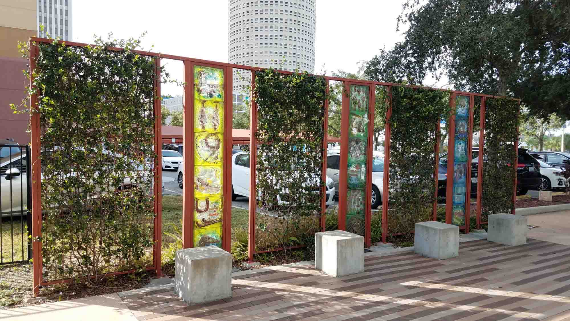 Vines growing over ECO-MESH® panels in the Tampa Art Promenade.