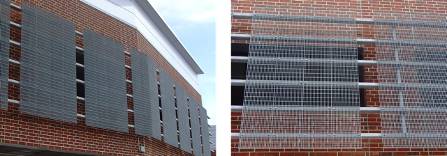 Multiple trim-banded Bar Grating panels that make up a façade on the side of a brick building.