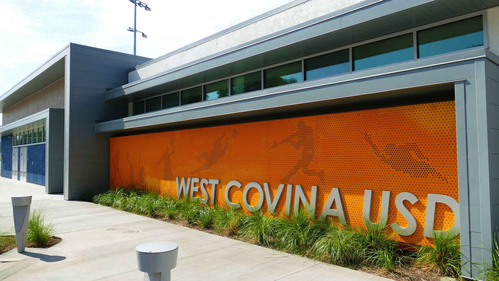 A wide shot of the custom Perforated Metal panels in West Covina, California at Edgewood High School's Aquatic Sports Complex.