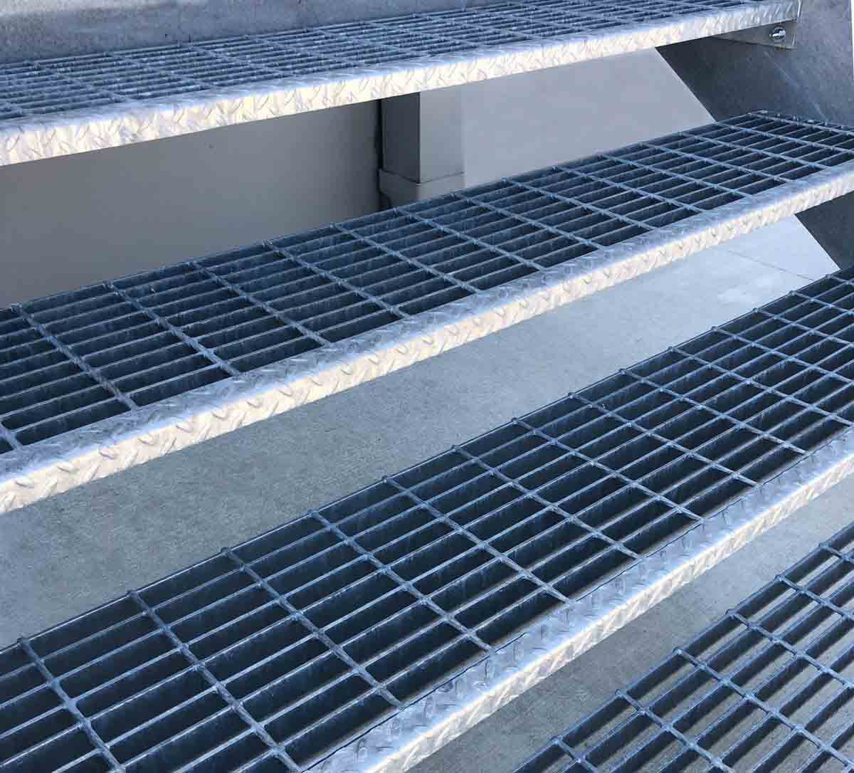 An up-close image of Bar Grating Stair Treads in use.