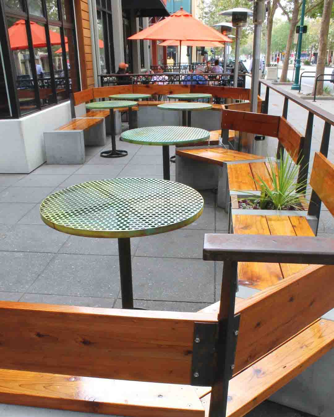 Perforated Metal used as the tops of tables at the Creek Eatery.