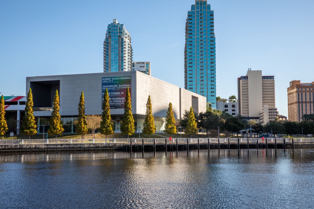 A skyline shot of the Tampa Museum of Art with Downtown Tampa behind it.