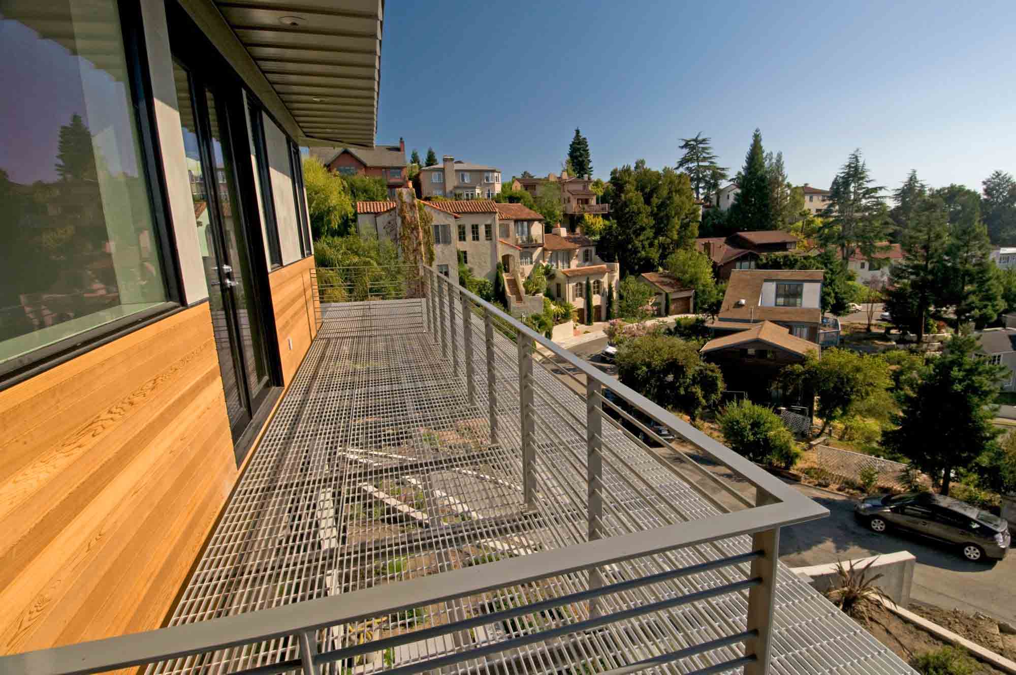 A Bar Grating platform at the Margarido House that is used as a catwalk and as an eco-friendly cooling system.