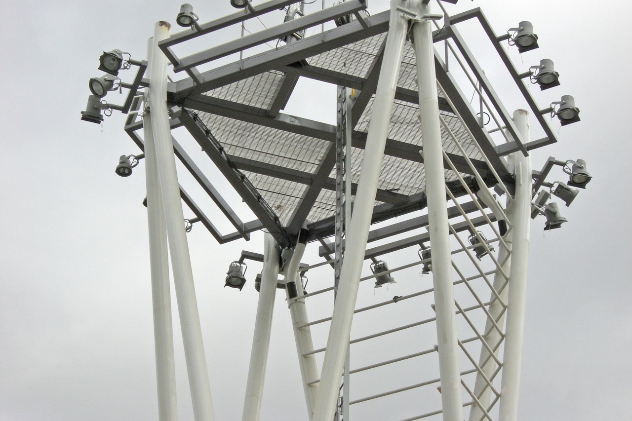 A photo looking up at a tower with a Bar Grating platform.