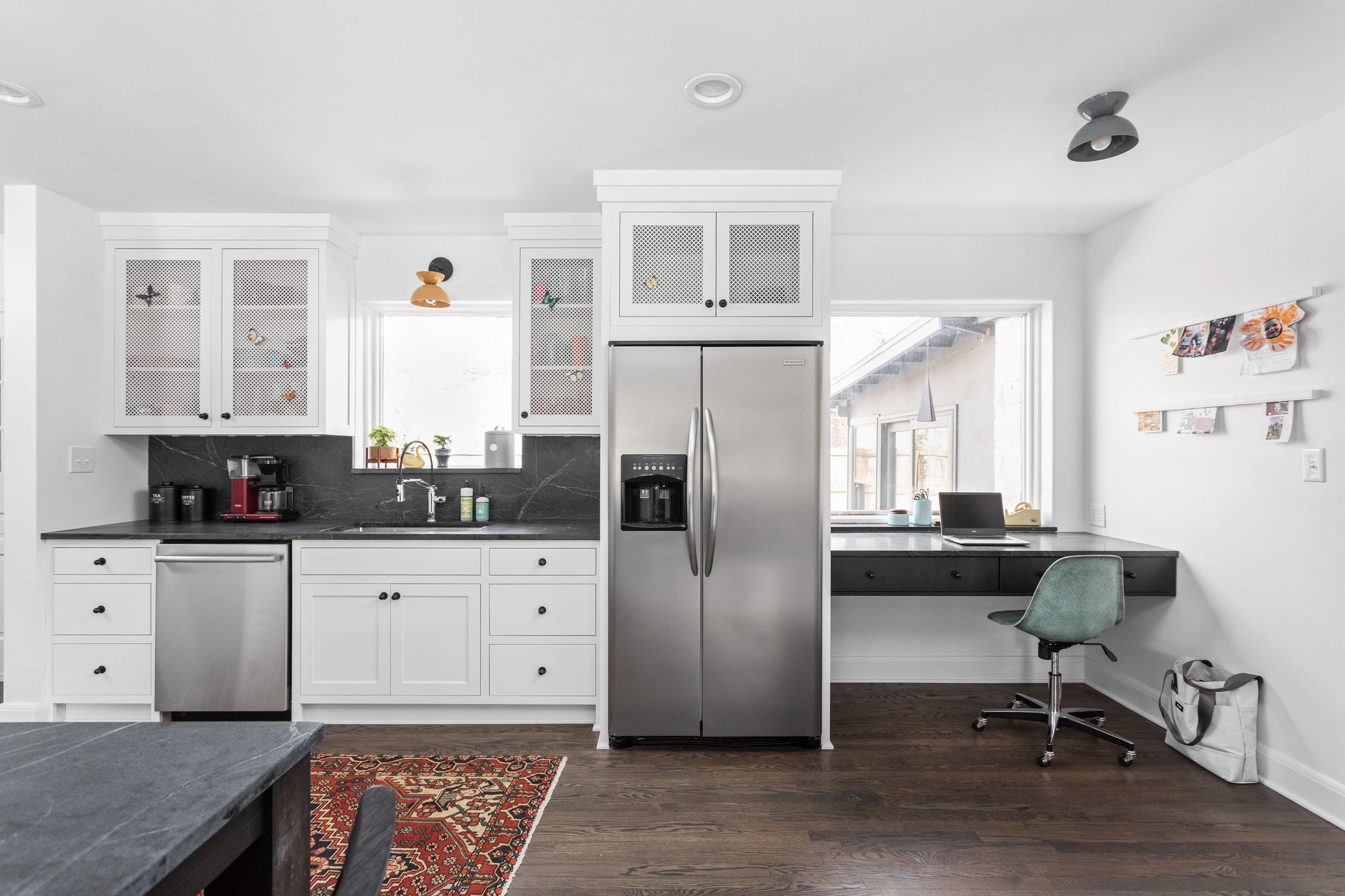 Designer Perforated Metal infill panels used as kitchen cabinet inserts.