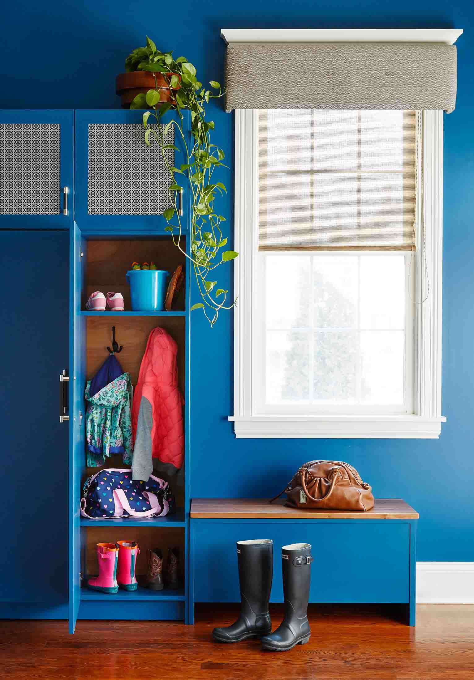 Designer Perforated Metal infill panels used as mudroom cabinet inserts.