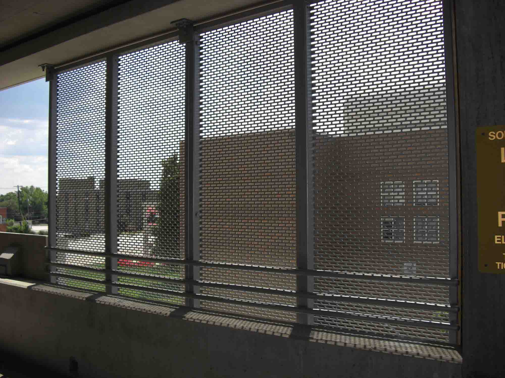 Slotted Perforated Metal infill panels used for security inside the parking garage.