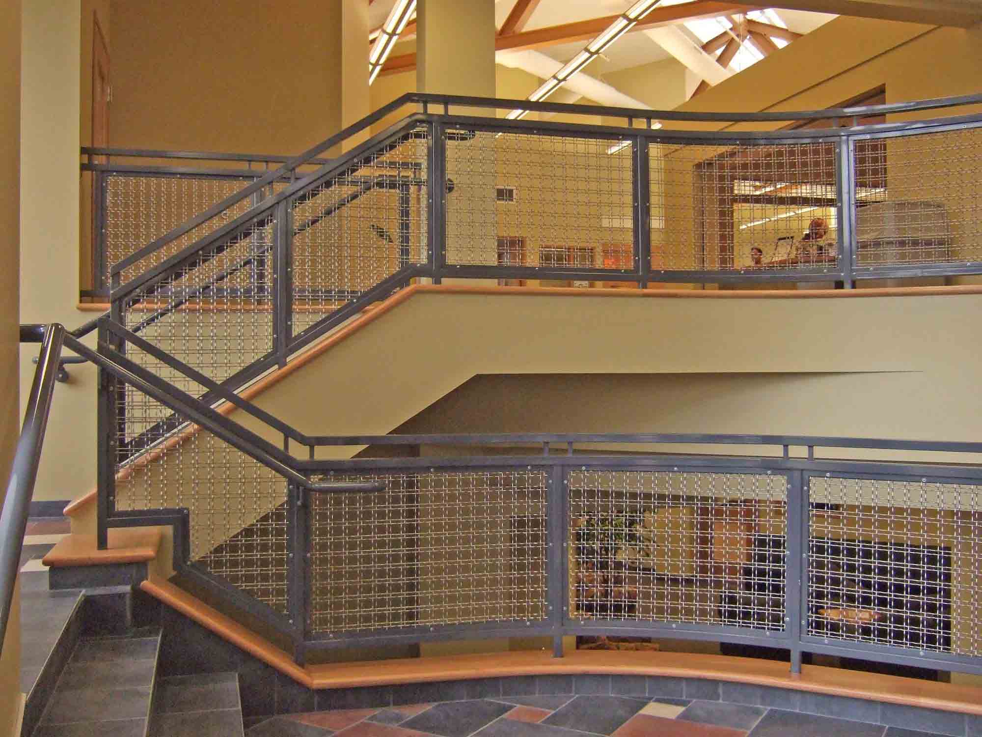 The staircase and railings inside a Walsh University dormitory.