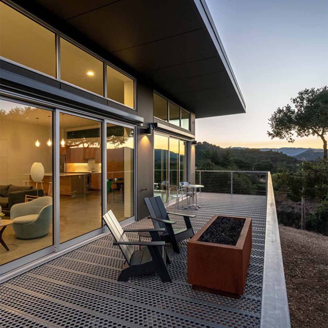 PERF-O GRIP® flooring used on a balcony, demonstrating the versatility of Specialty Metals for architects and designers.