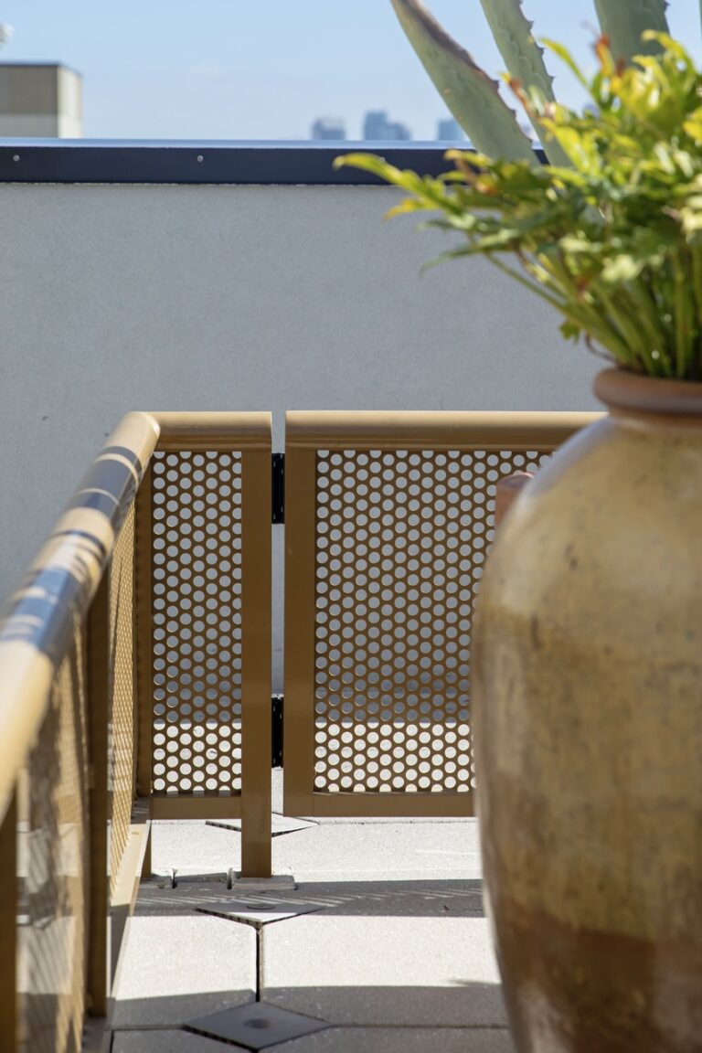 Round Perforated Metal Infill Panels at Sal Y Mar Rooftop in Tampa, FL.
