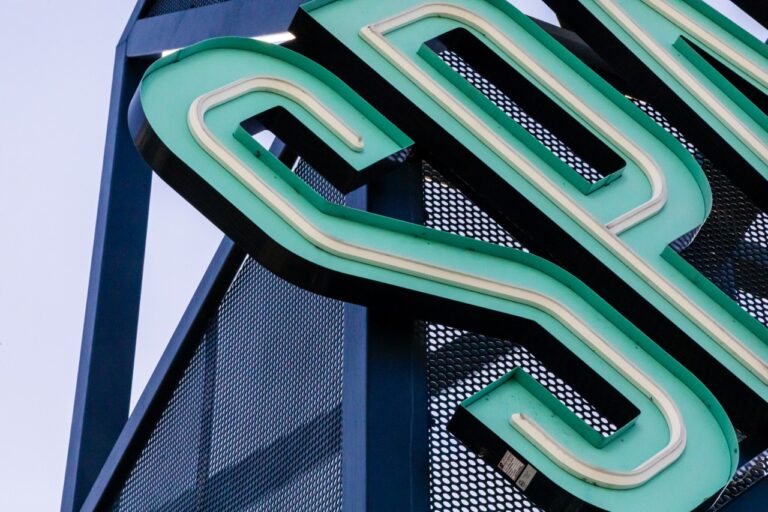 Round Perforated Metal signage at Sparkman Warf in Tampa, FL.