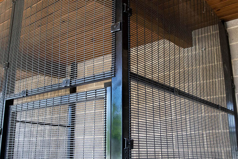 Containment partitions incorporating Rectangular Welded Wire Mesh within a reinforced steel frame.
