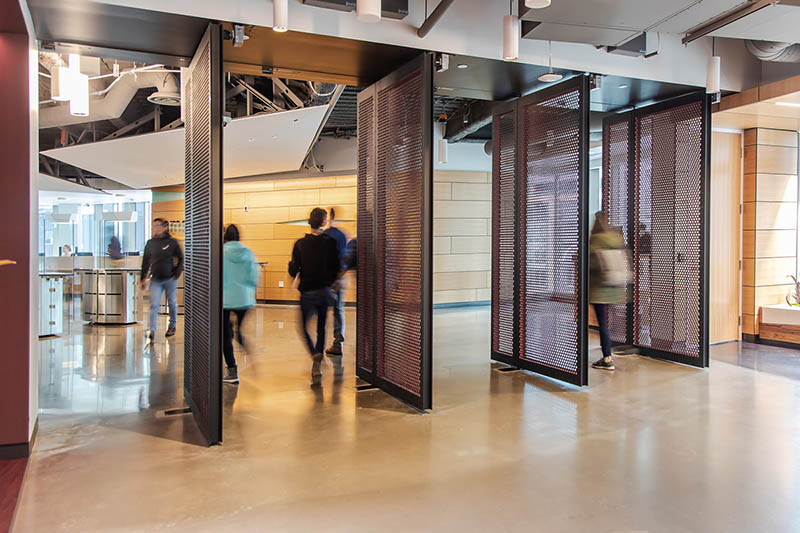 Round Hole Perforated Metal doors in an Amazon Office.