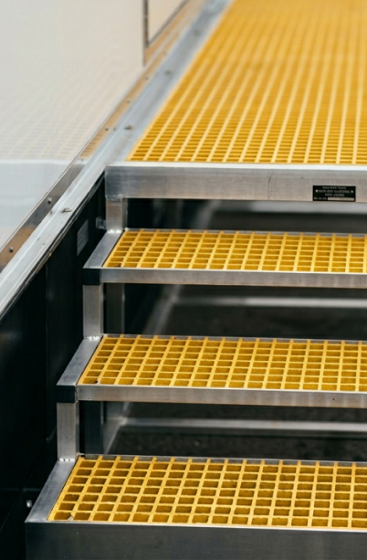Yellow Square Molded Fiberglass Grating Stair Treads.