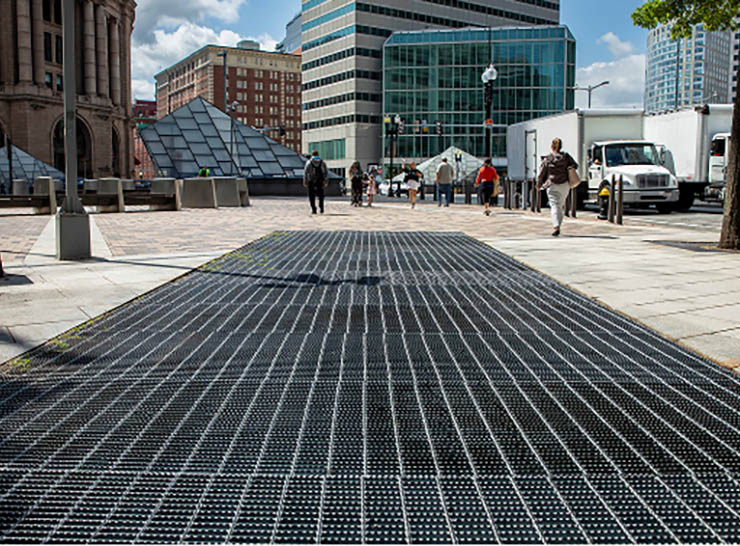 Bar Grating panels making up a trench drain.
