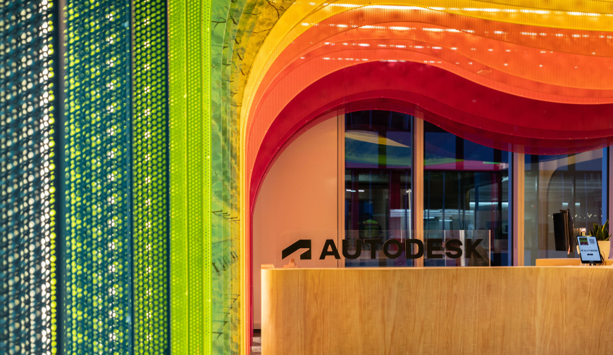 Perforated Metal wall cladding with powdering coating enhances an autodesk office.