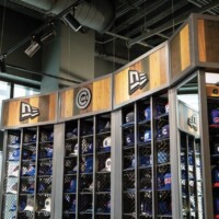Shelving for Chicago Cubs cap display that uses Square Wire Mesh with a Lock Crimp Weave in a team store setting.
