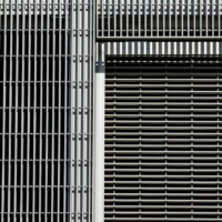 McNICHOLS® Swage-Locked Anodized Bar Grating siding on the Tampa River Center.