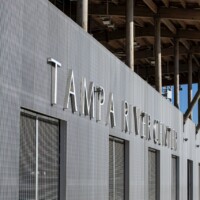 McNICHOLS® Swage-Locked Anodized Bar Grating siding on the Tampa River Center.
