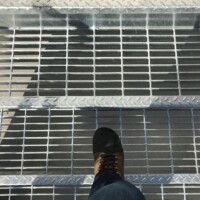 McNICHOLS® Standard-Duty Welded Bar Grating Stair Treads with a smooth surface.