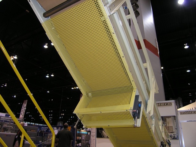 A photo of square perforated metal being used on equipment.