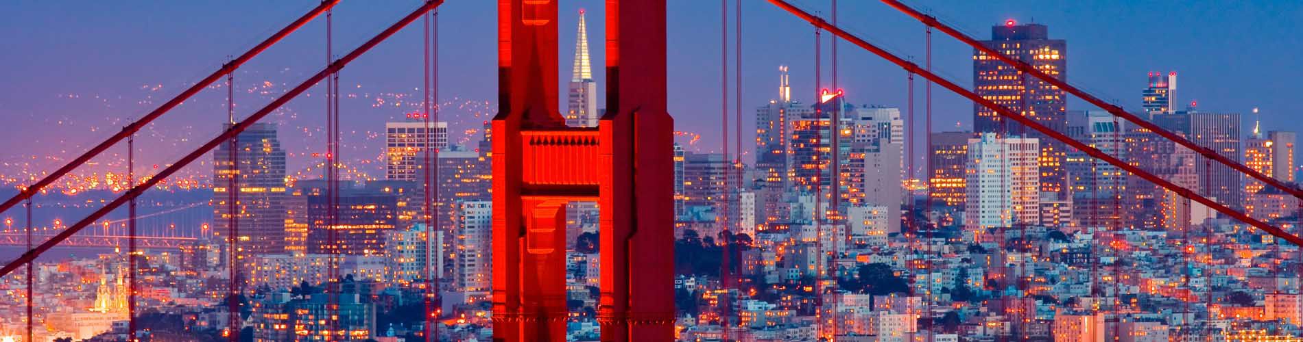 A skyline view of downtown San Francisco and the Golden Gate Bridge.